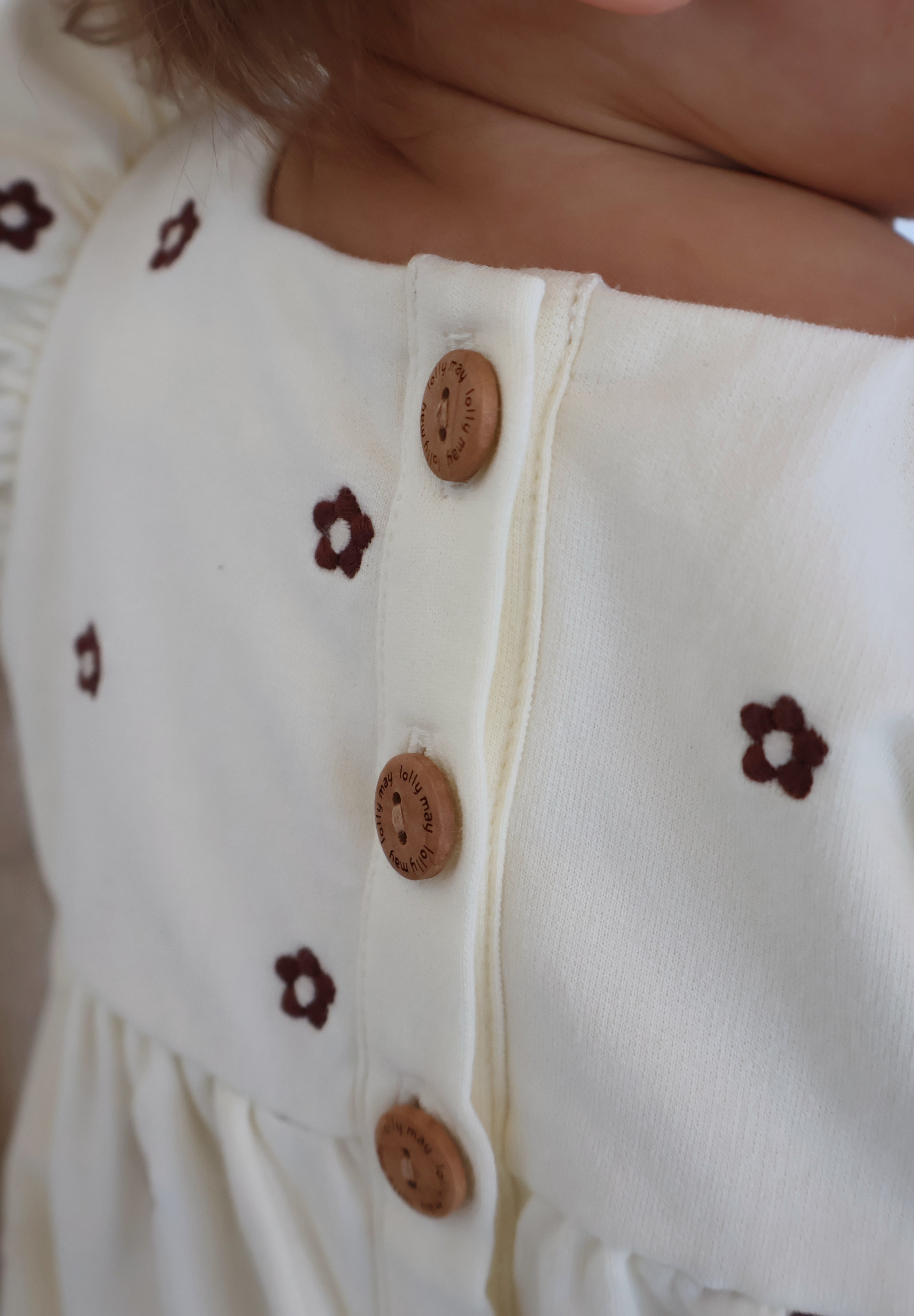 Custard Embroidered Romper